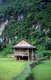 Vietnam: Black Tai stilt house in a rice paddy field near Son La, Northwest Vietnam