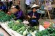 Vietnam: Tai women selling vegetables in the market at Thuan Chau (Thuận Châu), Son La (Sơn La) Province, Northwest Vietnam